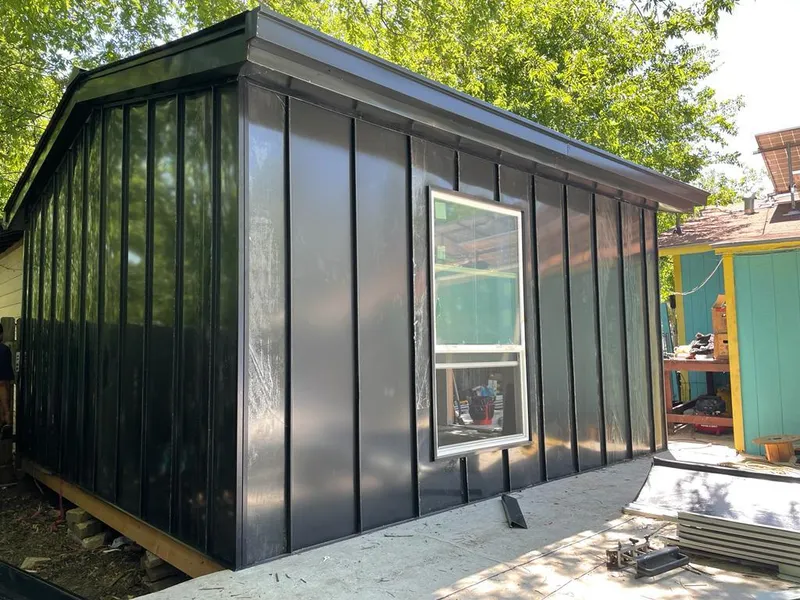 Black standing seam metal wall panels for Metal Roof Installation in Shenango