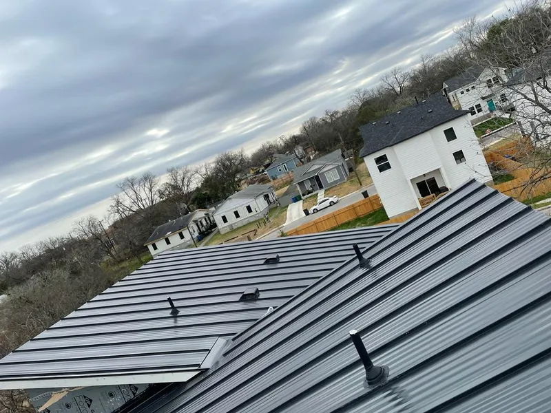 Standing seam metal roof panels with vents for Skylight Repair in Shenango